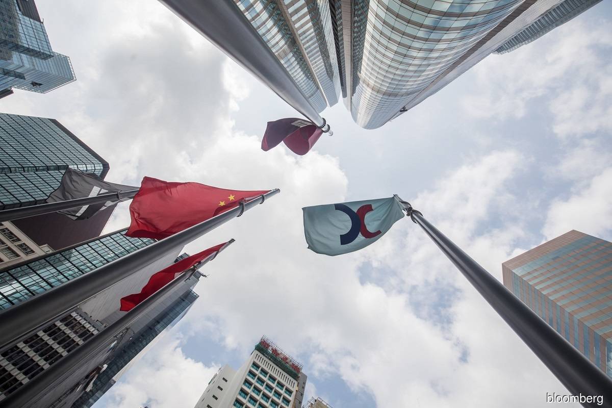 Chinese stocks climb as economic data, easing contagion fears lift risk mood
